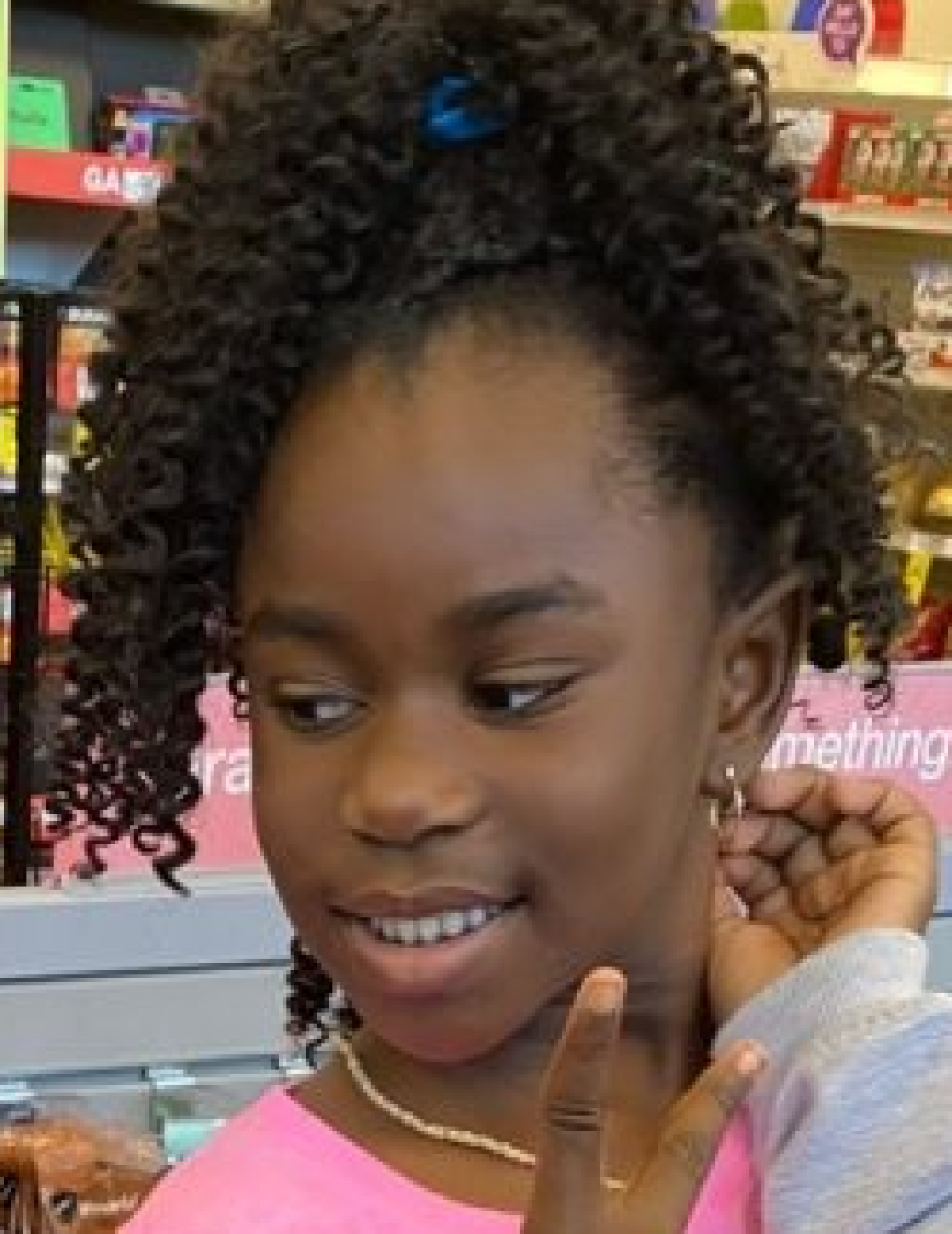 Talaya Carter. Missing child with black hair, brown eyes, and braids.