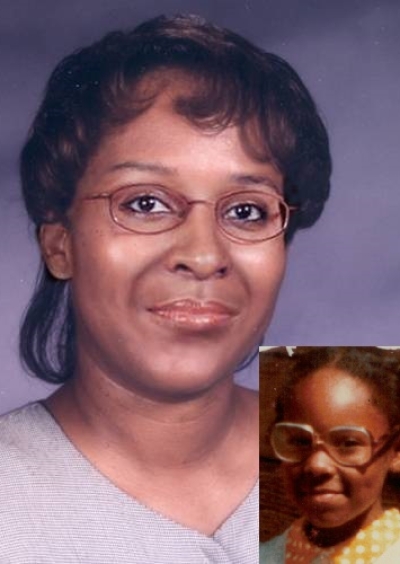 Toya Hill. Missing child with black hair, brown eyes, and brown glasses.