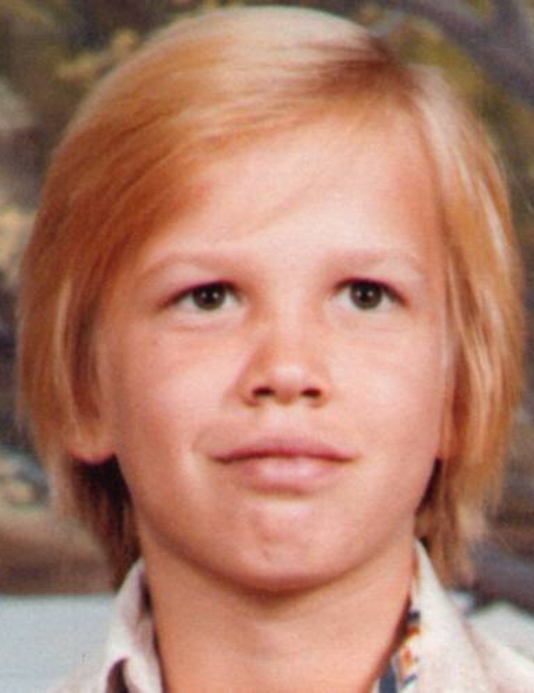 David Warner. Missing child with blonde hair and brown eyes.